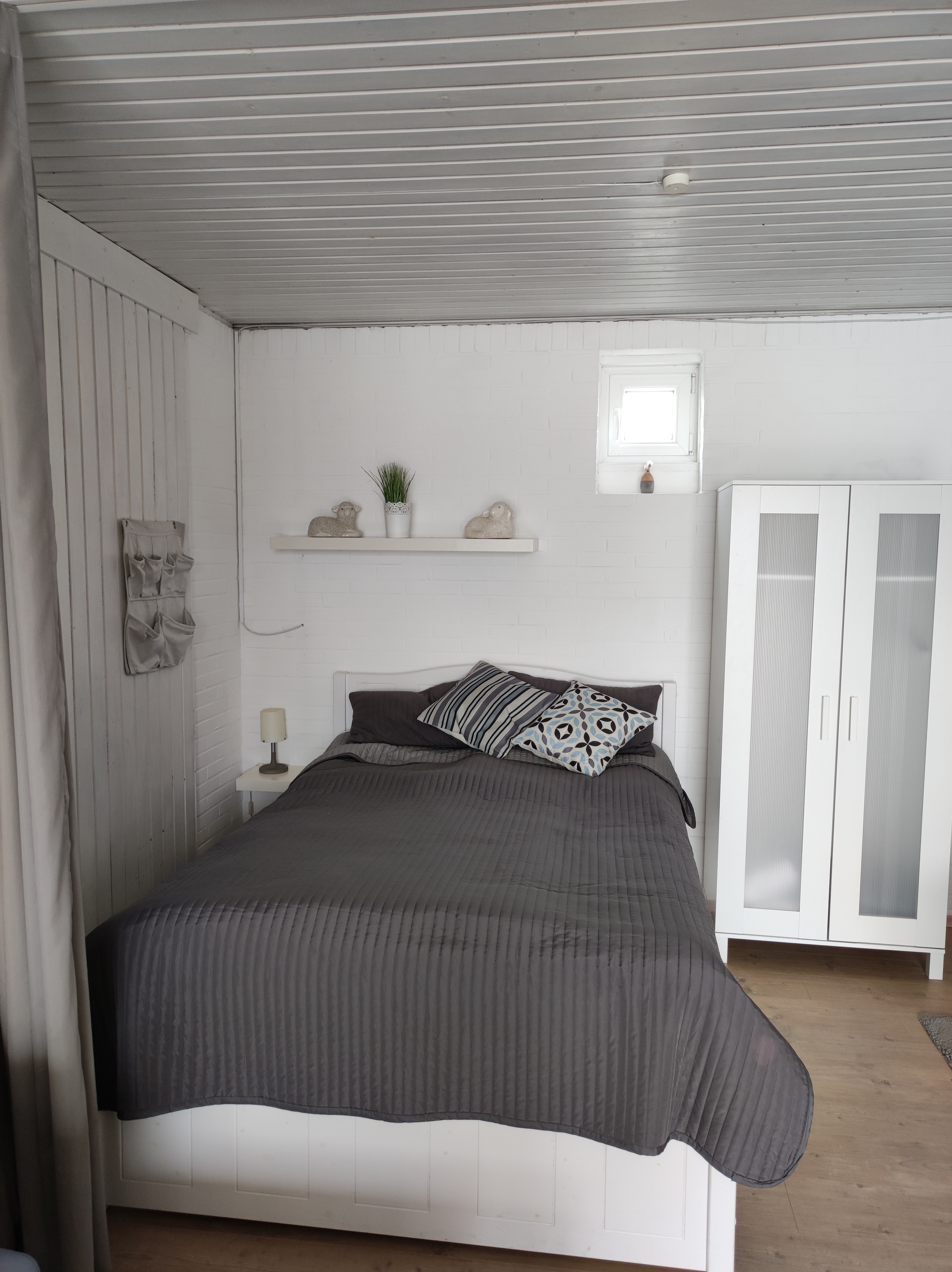 Schlafbereich mit Doppelbett